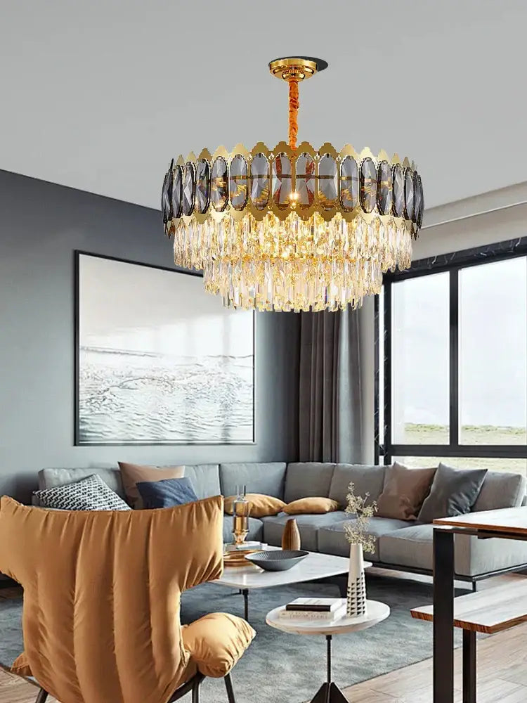 Modern gold decorbites crystal ceiling chandelier with cascading crystal droplets and scalloped upper ring for living room