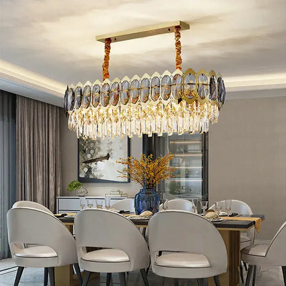 Modern gold decorbites crystal ceiling chandelier with oval crystal panels and cascading glass prisms for living room decor