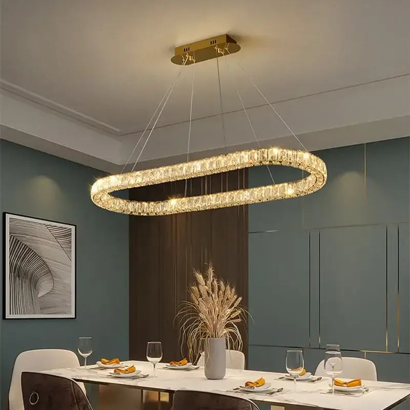 Modern gold decorbites crystal ceiling chandelier featuring oval design with sparkling crystal rings for living room lighting
