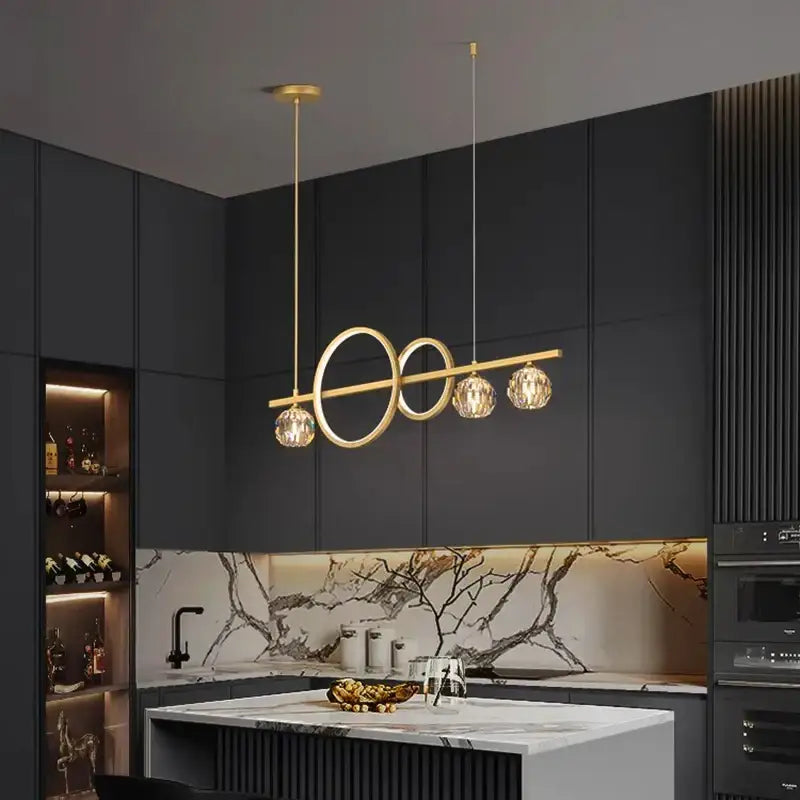 Modern gold decorbites crystal chandelier pendant light with intersecting rings and crystal globe bulbs for dining room