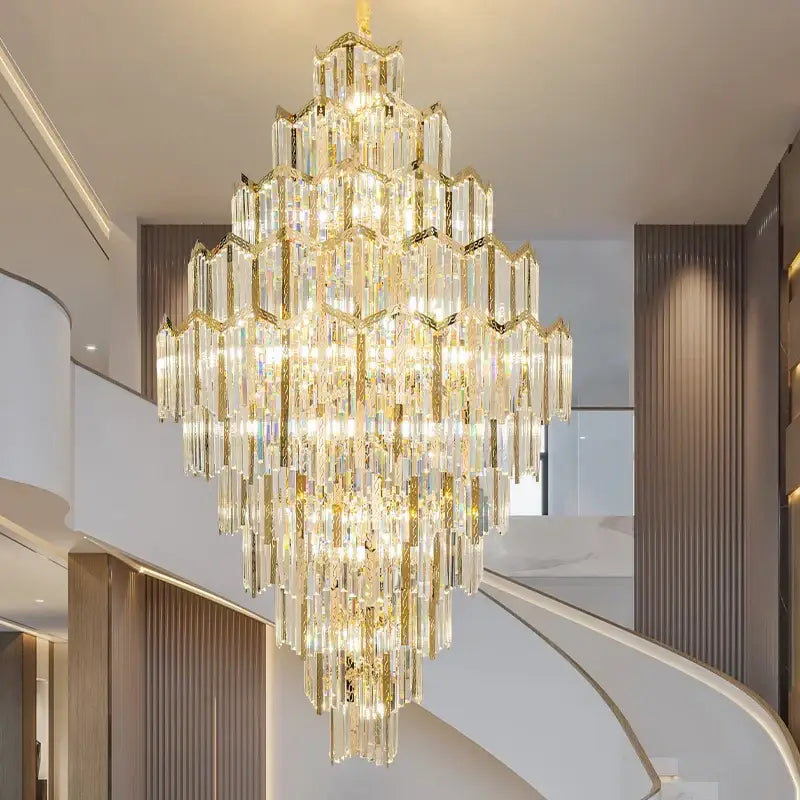Modern gold decorbites crystal chandelier with tiered cascading design and polished brass accents for living room loft