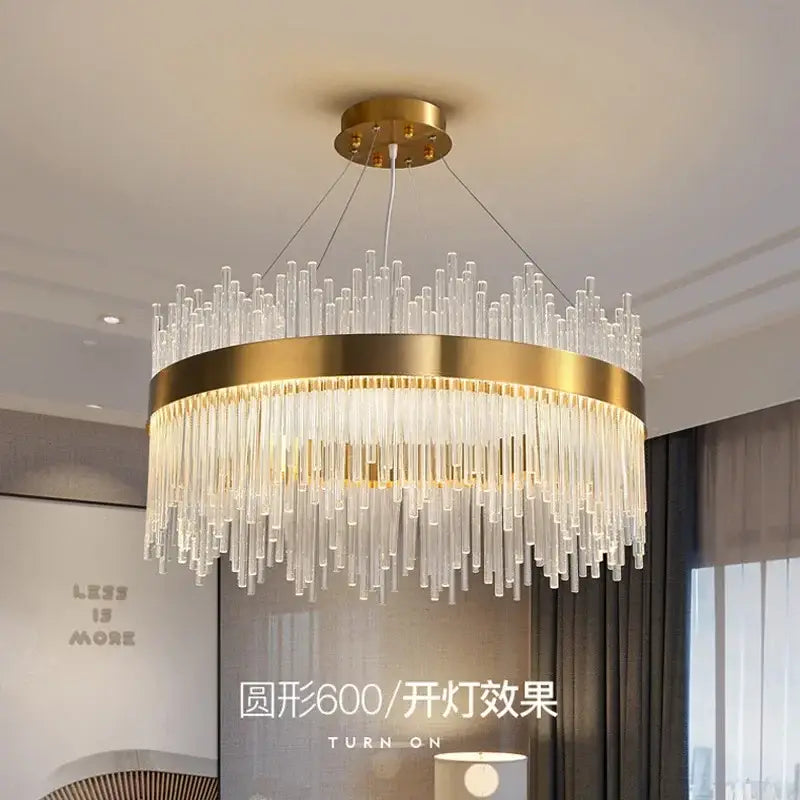 Modern gold decorbites crystal chandelier with cascading clear glass tubes for elegant living room lighting