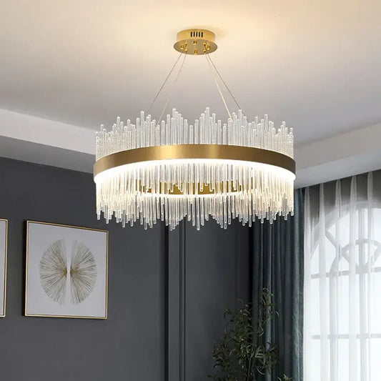Modern gold decorbites crystal chandelier featuring clear glass rods in a cascading design for living room use