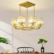Modern gold decorbites crystal chandelier with five rectangular glass shades and square ceiling mount for living room