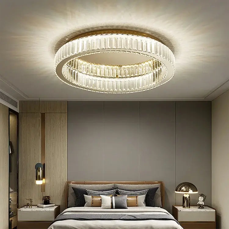 Modern gold decorbites crystal circle ceiling chandelier featuring two concentric faceted crystal rings in a polished frame