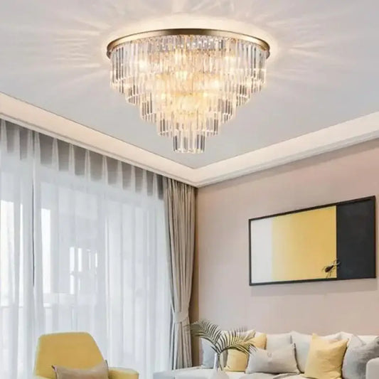 Modern gold decorbites crystal flush ceiling light with cascading clear faceted crystals for bedroom use