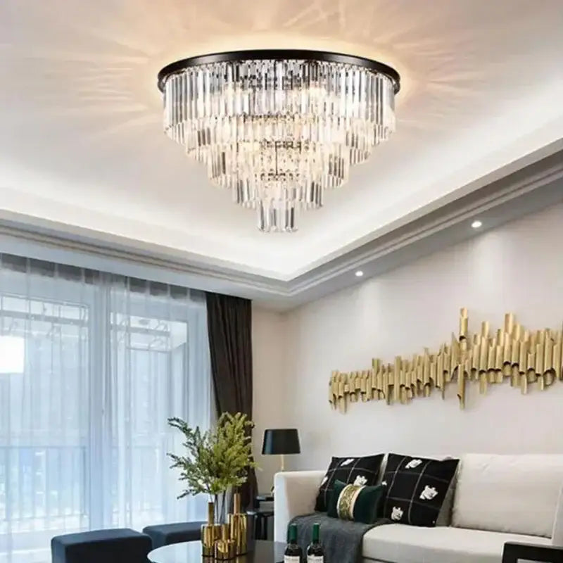 Modern gold decorbites crystal flush ceiling light with black circular frame and cascading clear crystal prisms for bedroom