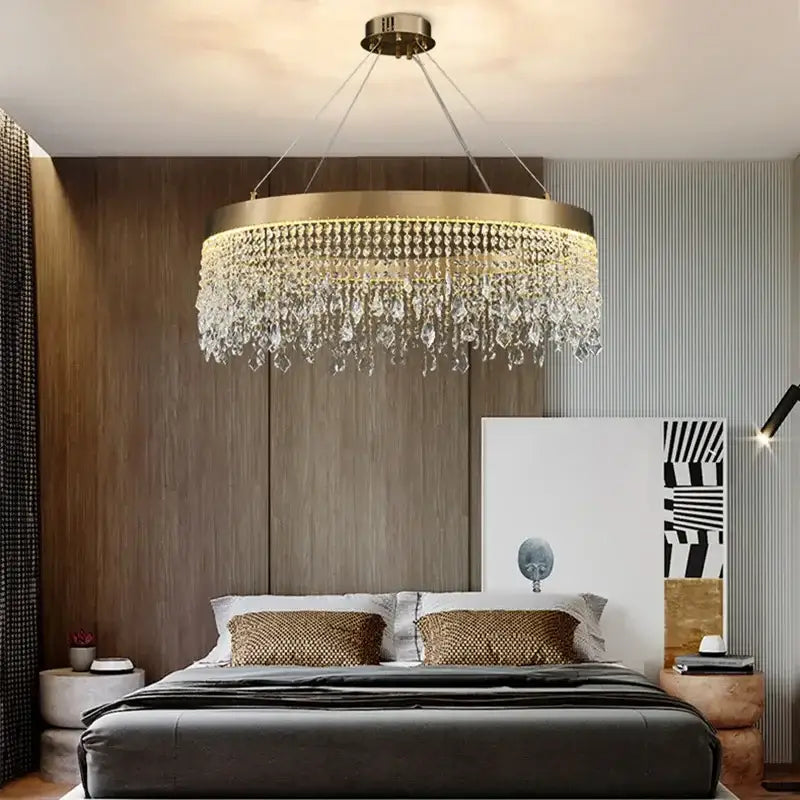 A modern gold decorbites crystal led ceiling chandelier with cascading crystal droplets for dining room lighting