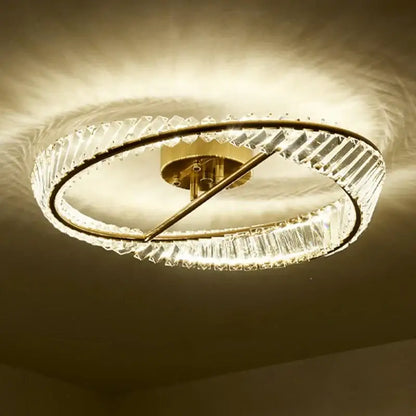 Modern gold decorbites crystal led ceiling light featuring two concentric rings with faceted clear crystals for dining room