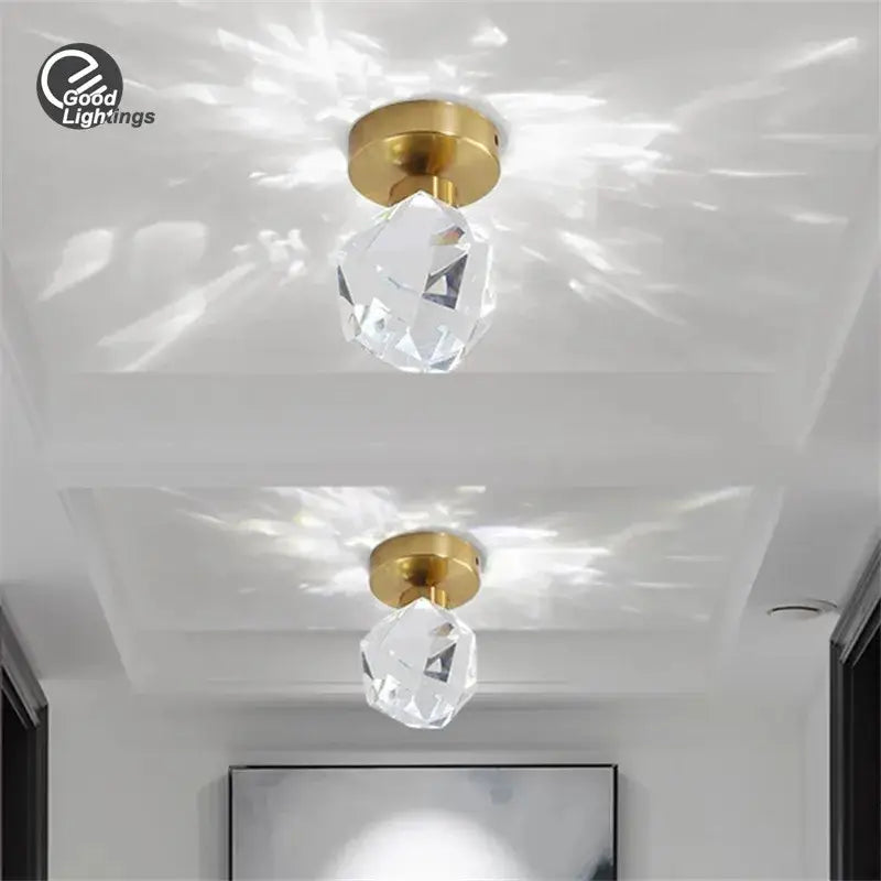 Modern gold decorbites crystal led ceiling light with clear crystal pendant and gold-toned metal base for living room