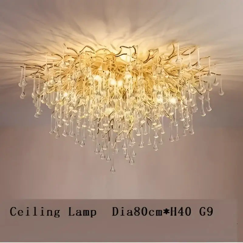 Modern gold decorbites crystal led chandelier with cascading glass droplets and intricate metalwork for dining room lighting