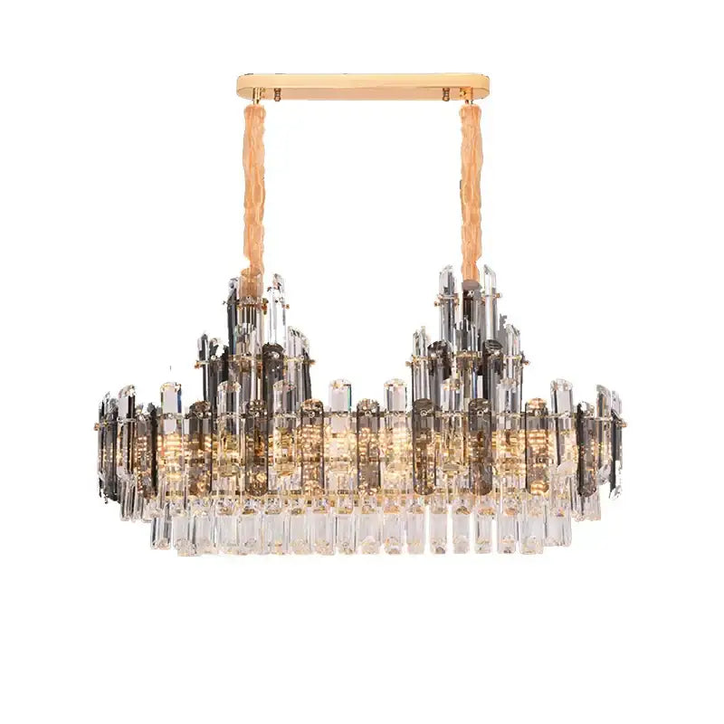 A modern gold decorbites crystal led chandelier with textured cords and cascading clear smoky crystal prisms