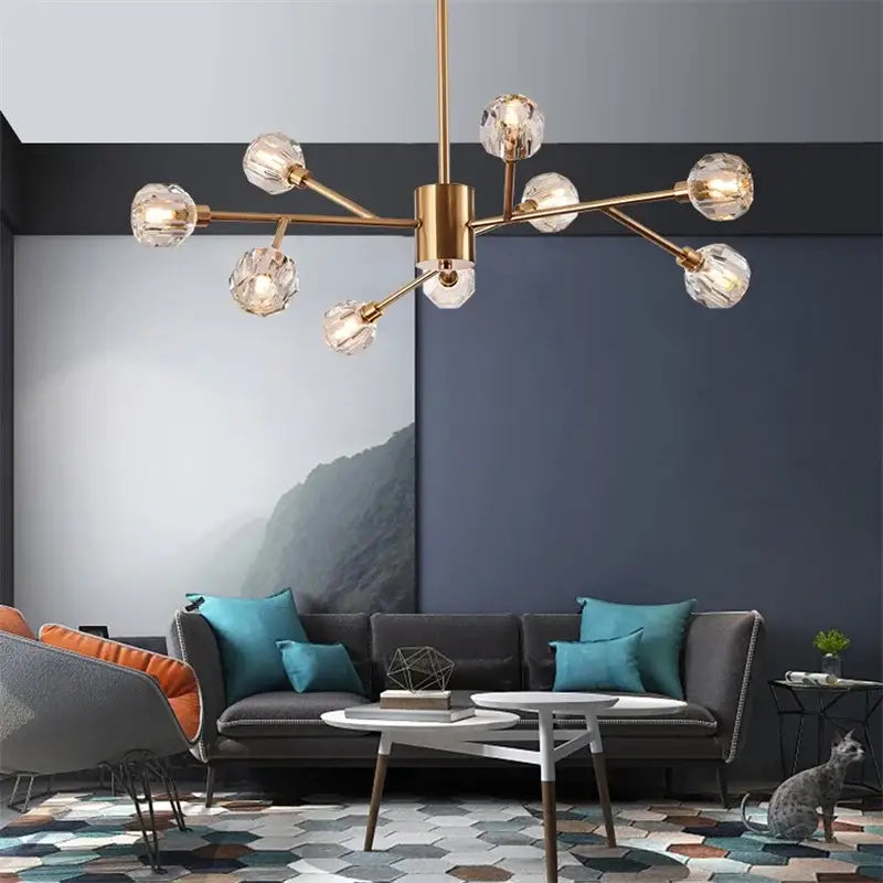 Modern gold decorbites crystal led chandelier with gold-toned frame and crystal globe bulbs for dining room lighting