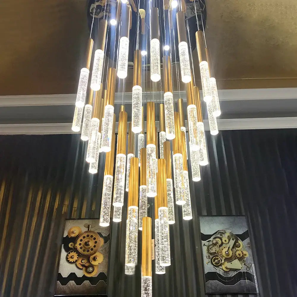 Modern gold decorbites crystal led chandelier with cascading cylindrical glass tubes for staircase living room decor