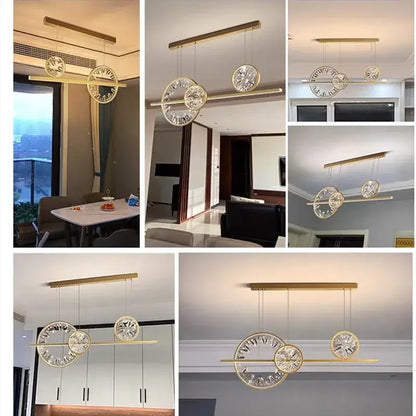 Modern gold decorbites crystal pendant chandelier with circular clock face design and crystal accents for dining room lighting