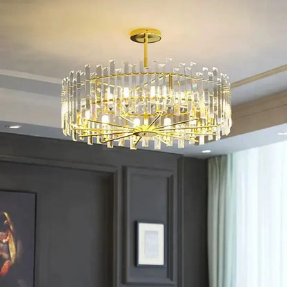 Modern gold decorbites crystal round chandelier with gold-toned frame and clear crystal rods for living room light