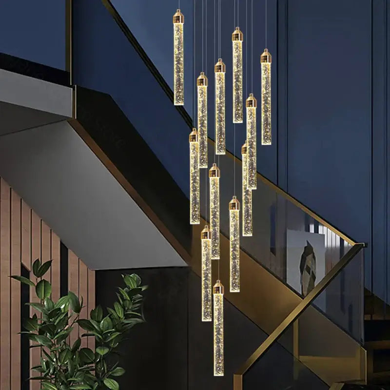Modern gold decorbites crystal staircase chandelier with golden cylindrical design and sparkling internal led lights for living room