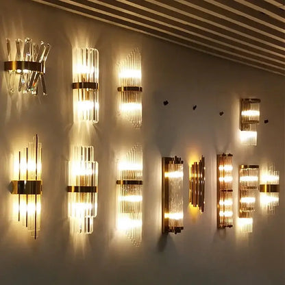 Modern gold decorbites crystal wall lamp with vertical crystal rods and warm light for luxury bedroom sconce lighting
