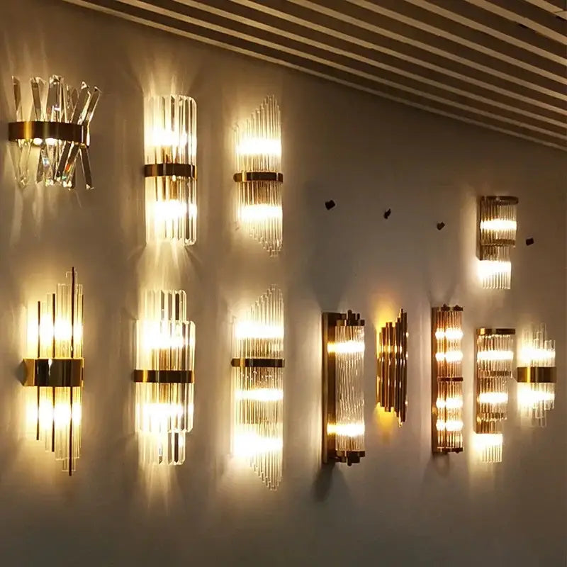 Modern gold decorbites crystal wall lamp with vertical crystal rods and warm light for luxury bedroom sconce lighting
