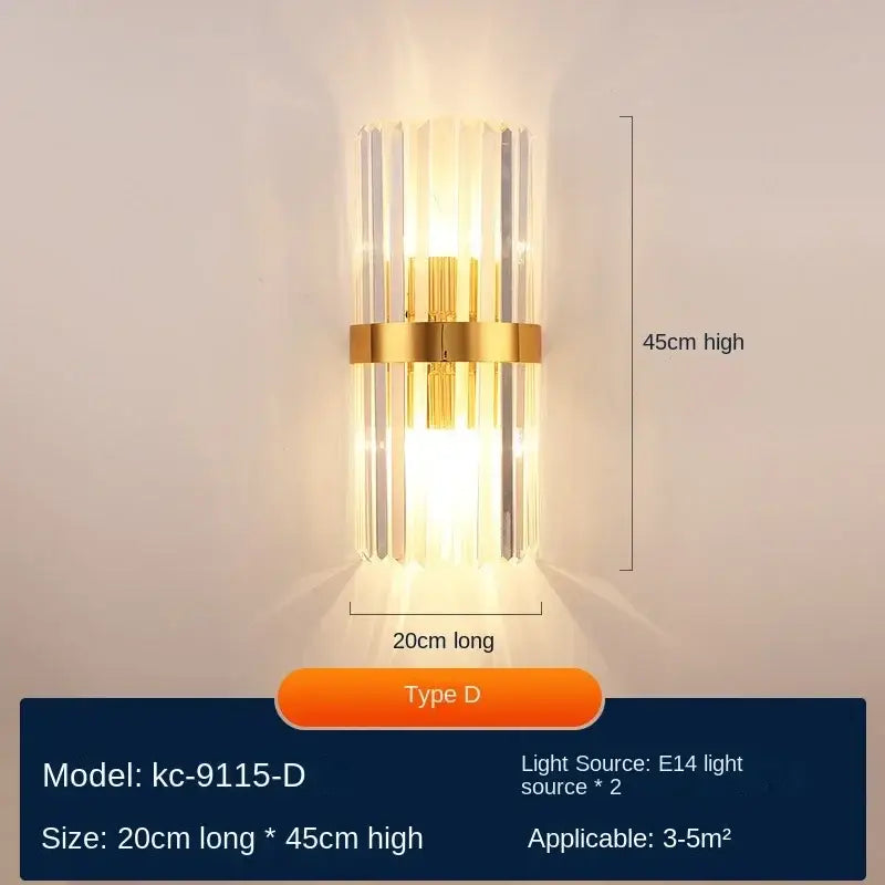 Modern gold decorbites crystal wall lamp with vertical crystal rods and brass band emitting warm light for luxury décor