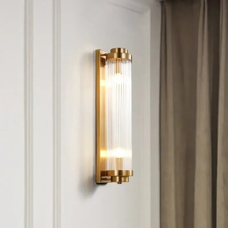 Modern gold decorbites crystal wall sconce with vertical glass prisms for elegant bedroom lighting