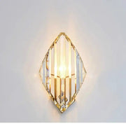 Modern gold decorbites crystal wall sconce with clear faceted crystal panels and gold-toned metal framing for living room