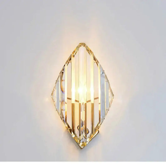 Modern gold decorbites crystal wall sconce with clear faceted crystal panels and gold-toned metal framing for living room