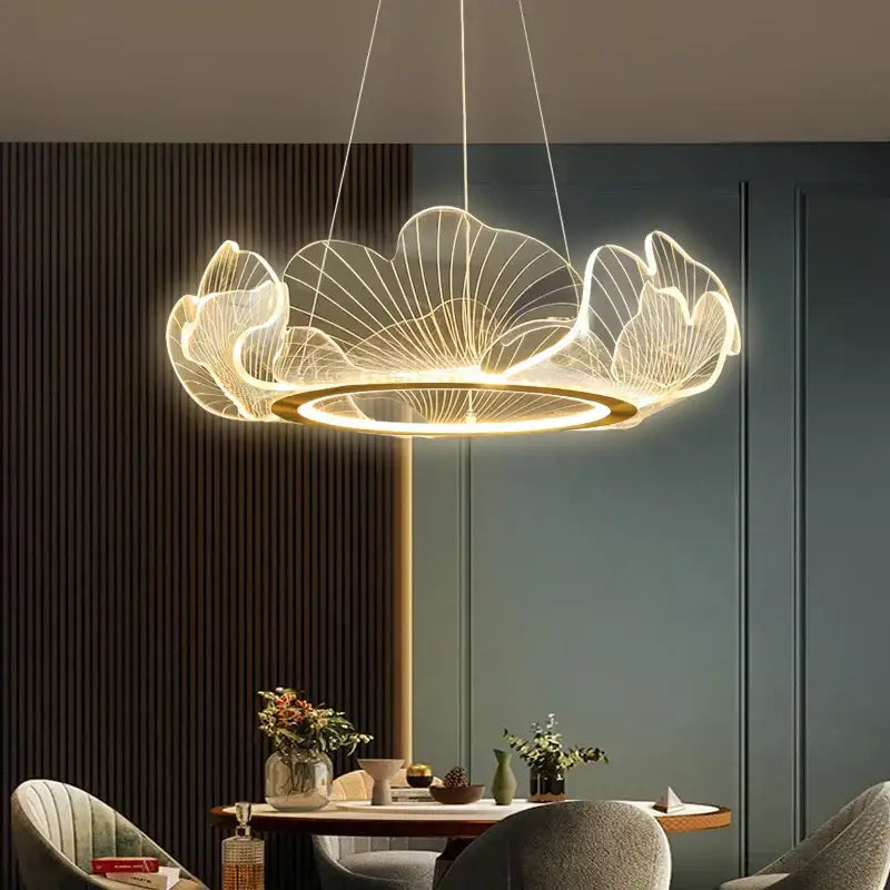 Modern gold decorbites ginkgo acrylic led pendant light with lotus-shaped wireframe petals and warm golden glow for dining room