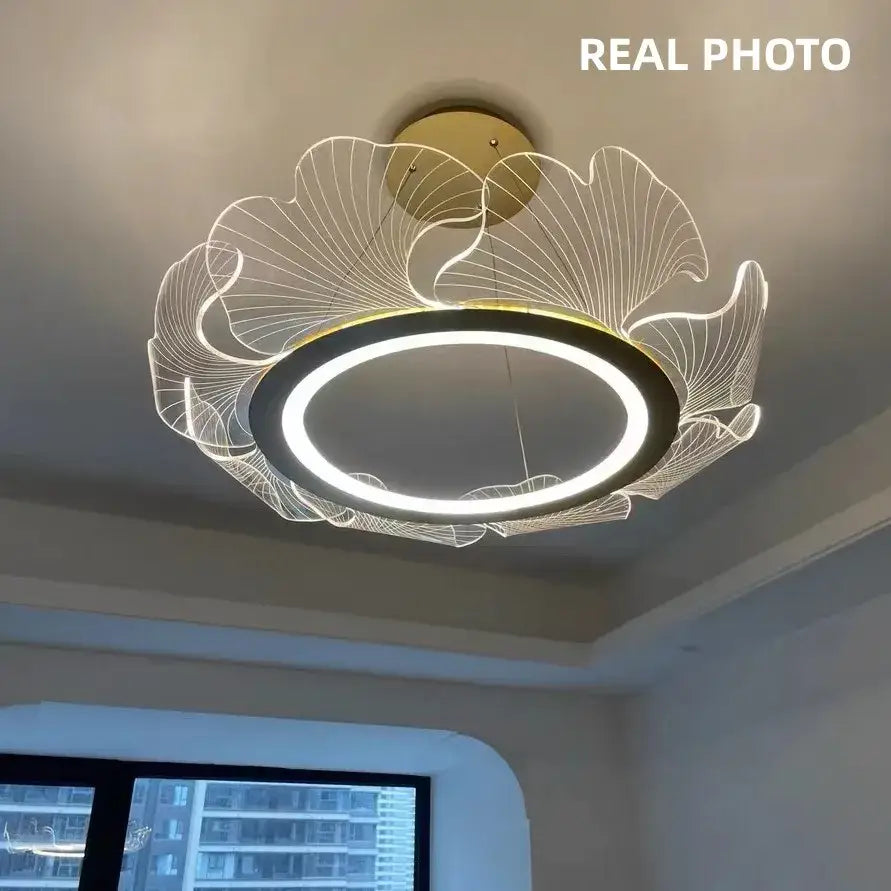 Modern gold decorbites ginkgo acrylic led pendant with circular led ring and leaf-like wireframe for dining room light