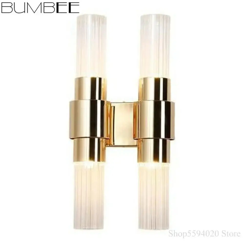Bumbee modern wall sconce with two gold decorbites iron glass lamps featuring ribbed glass shades for living room decor