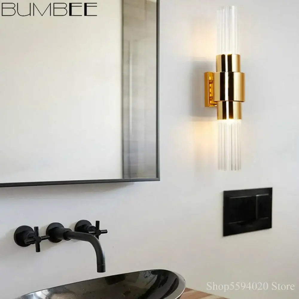 Modern gold decorbites iron glass lamps living room wall sconce with gold-toned iron frame and clear glass rods