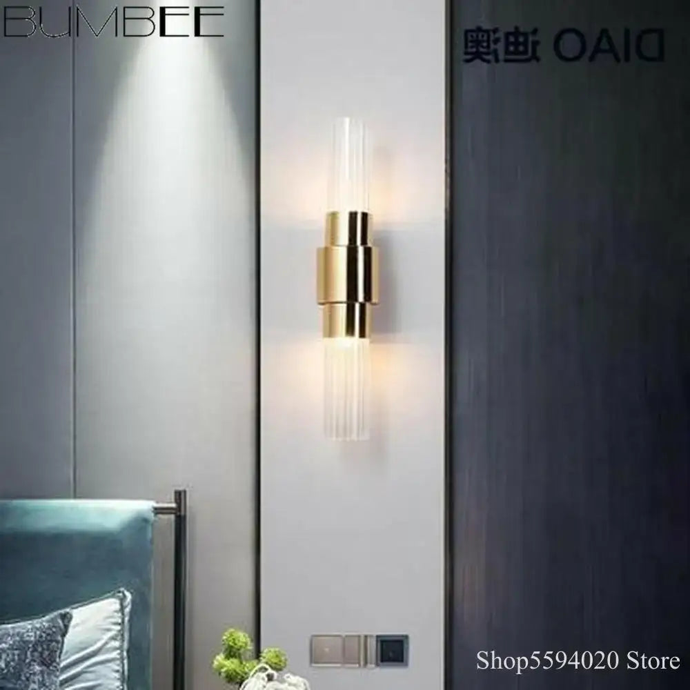 Modern gold decorbites iron glass wall sconce with clear acrylic shades and stacked metallic rings for living room decor