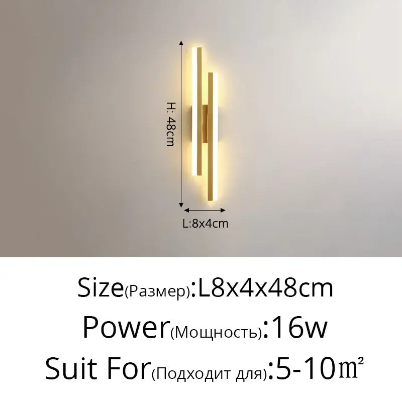Modern gold decorbites led strip wall lamp with two vertical bars and central accent emitting warm bedroom light