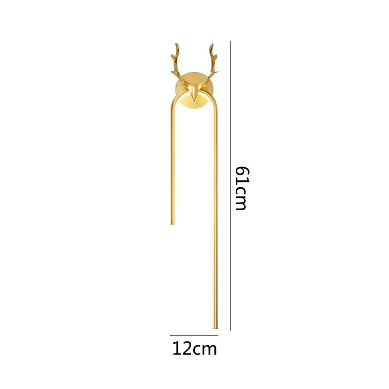 Modern gold deer head wall lamp with metal antlers and sleek elongated design by decorbites for stylish decorbites deer head wall use