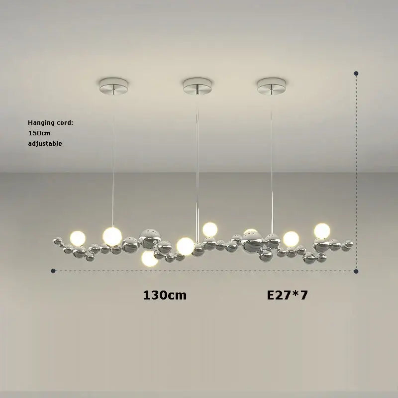 Modern chrome-finished decorbites designer molecule chandelier with spherical bulbs in an organic branching design for dining room decor