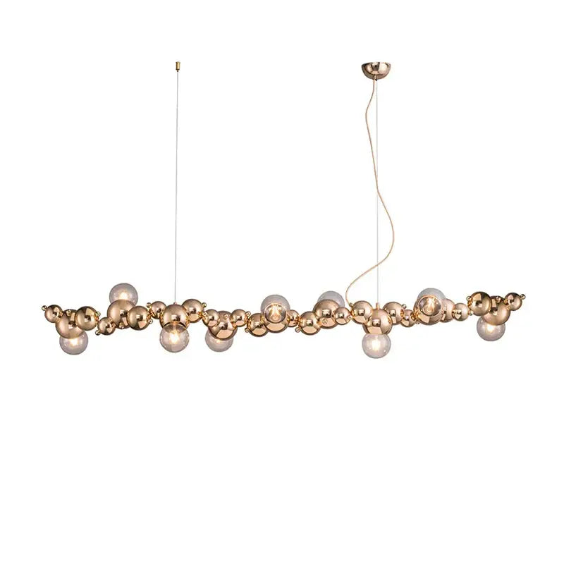 Modern gold designer molecule chandelier dining room pendant light with polished rose gold and clear glass orbs by decorbites designer
