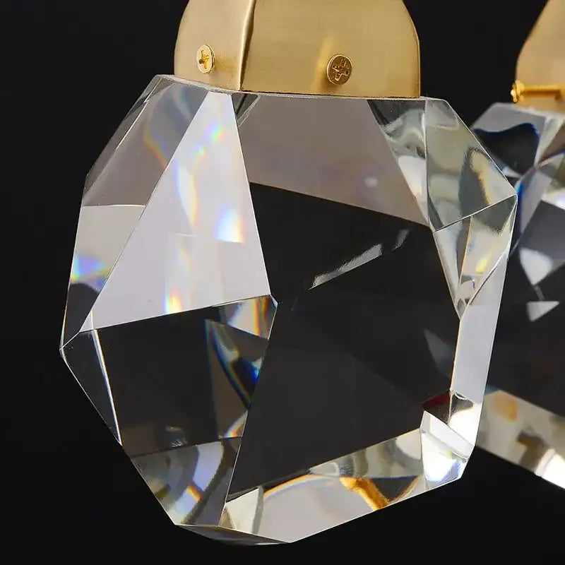 Modern gold diamond crystal ball chandelier pendant with clear faceted crystal and polished gold-toned metal cap