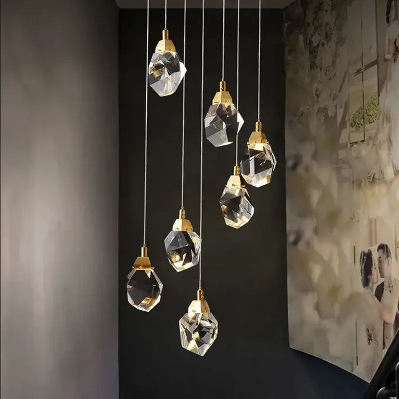 Modern gold diamond crystal ball chandelier with crystal ball pendant lights and gold-toned fixtures for living room