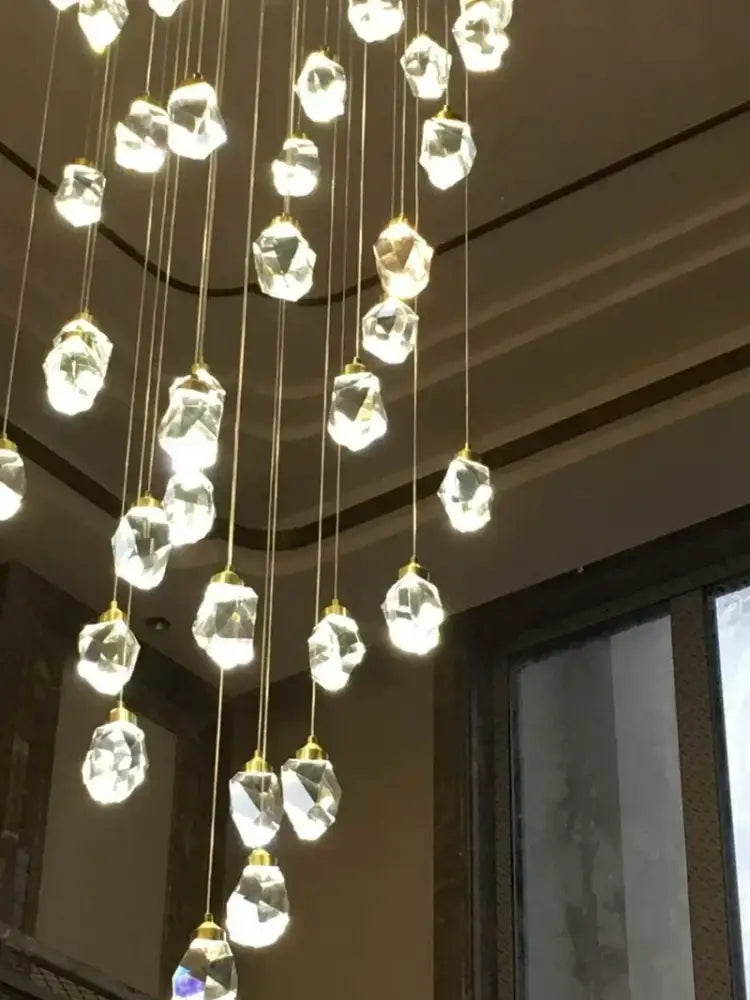 Modern gold diamond crystal chandelier with faceted clear glass pendants for living room staircase lighting