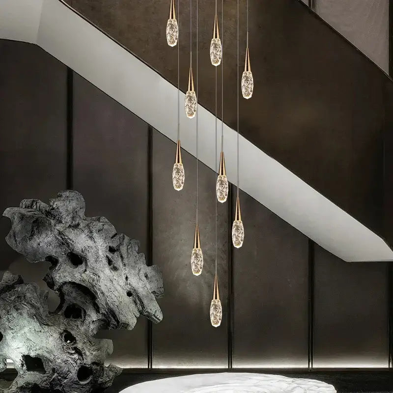 Elegant modern gold diamond crystal chandelier pendant lights with faceted crystal droplets for living space decor