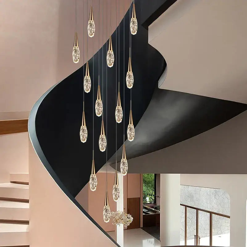 A modern gold diamond crystal chandelier with teardrop-shaped crystal pendants for elegant living space lighting