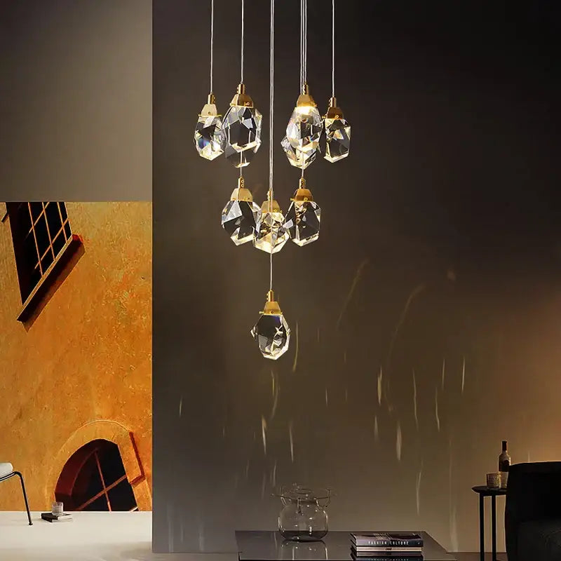 Modern gold diamond crystal chandelier with faceted glass pendants and metal fixtures for living room staircase light