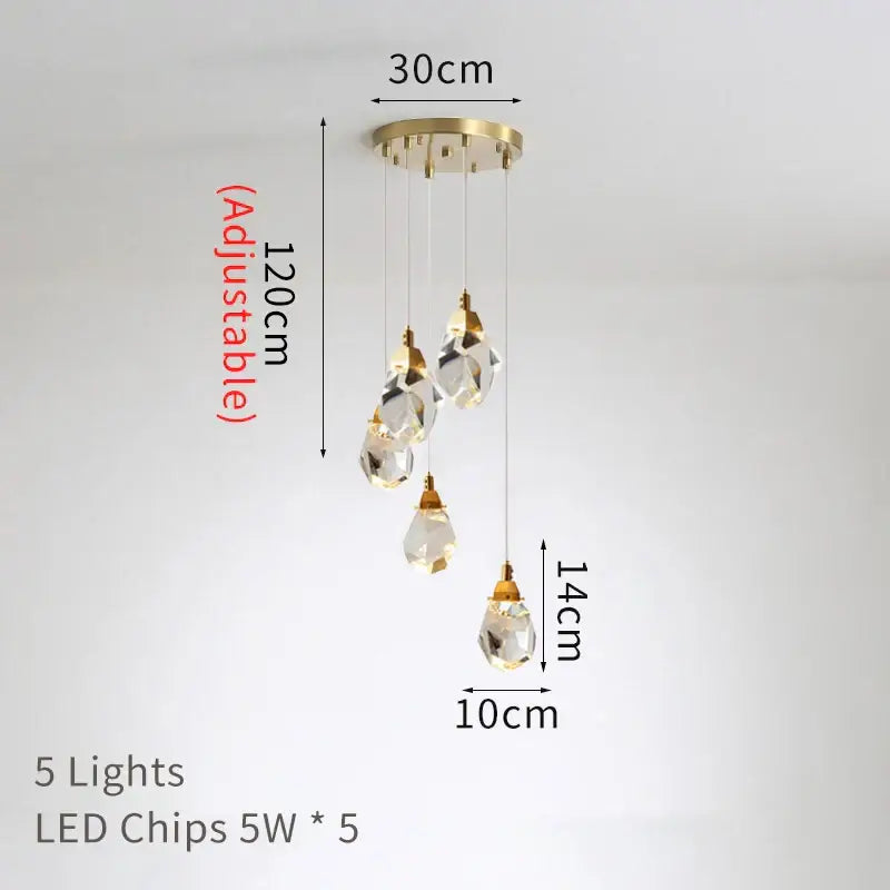 A modern gold diamond crystal led ceiling chandelier with five clear glass pendants for dining room lighting