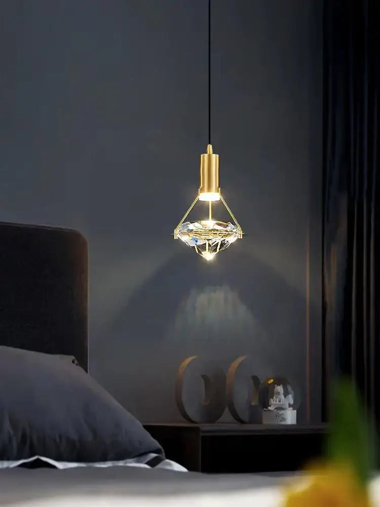 Modern gold diamond crystal pendant light with geometric frame and clear accents for bedroom illumination pendant lights