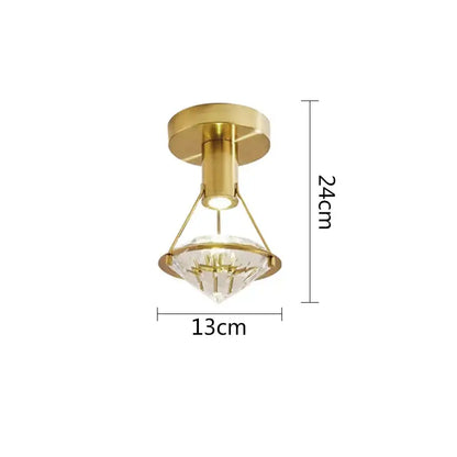 Modern gold diamond crystal wall lamp with clear faceted crystal shade for elegant bedroom lighting