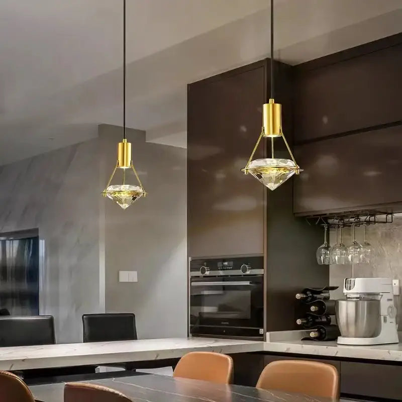 Modern gold diamond crystal wall lamp with faceted crystal shades designed for bedroom and kitchen use