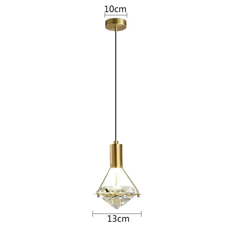 Modern gold diamond crystal wall lamp with clear crystal facets and black cord for bedroom lighting