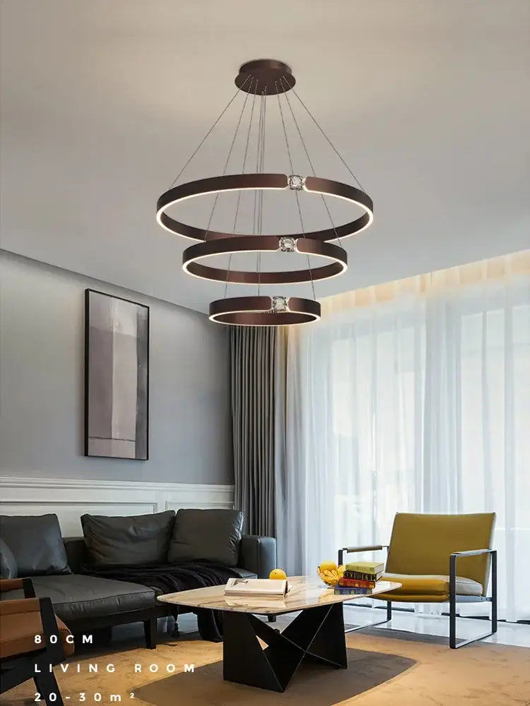 Modern gold diamond ring chandelier with bronze-toned circular frame and embedded crystal accents for luxury living rooms