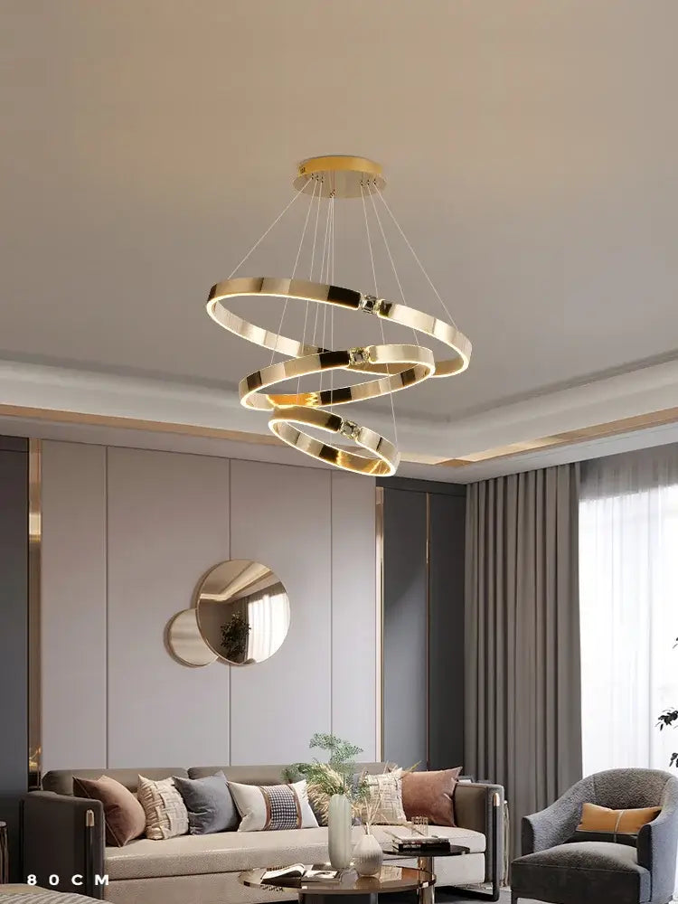 Modern gold diamond ring chandelier featuring a gold-toned spiral ring chandelier design for luxury living rooms