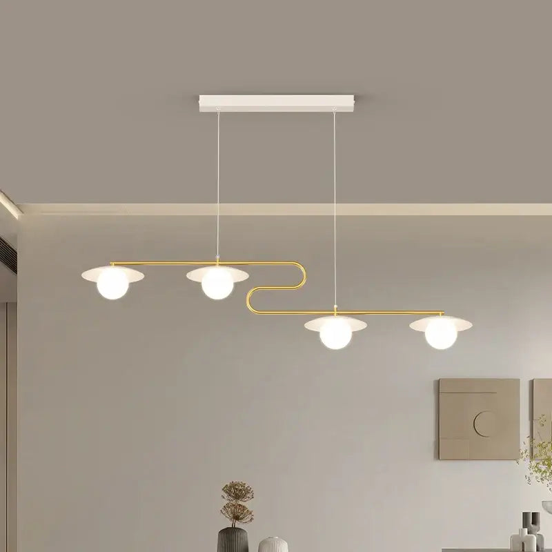 Modern gold dimmable led ceiling chandelier with three white glass shades by decorbites for dining room decor